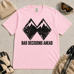 Blossom tee featuring a distressed black double-mountain graphic above the phrase “Bad Decisions Ahead.”
