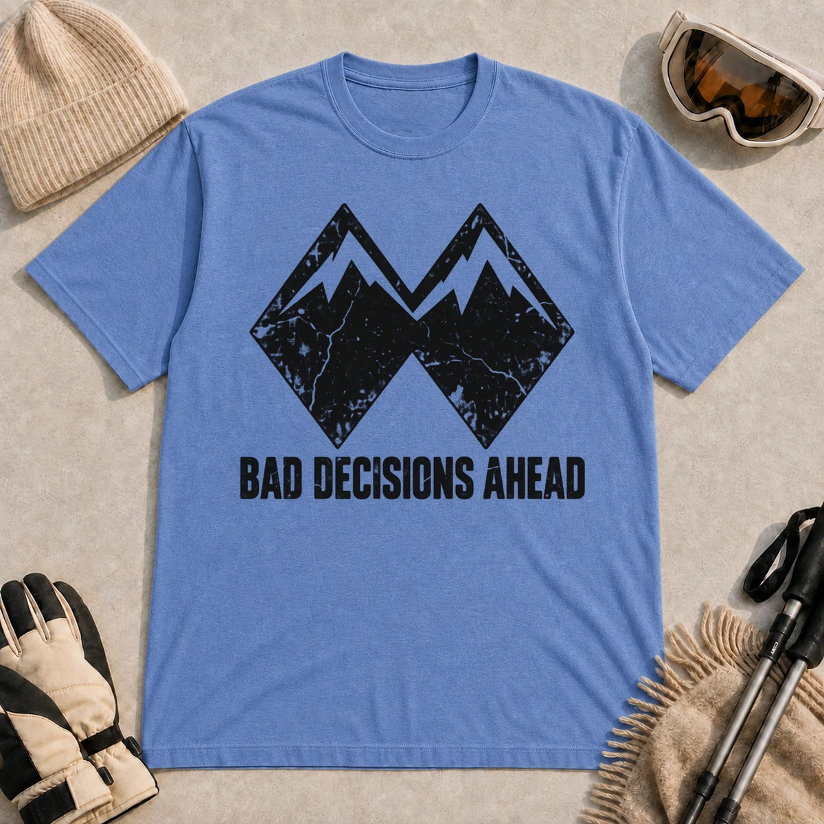 Heather Royal tee featuring a distressed black double-mountain graphic above the phrase “Bad Decisions Ahead.”