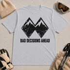 Sport Grey tee featuring a distressed black double-mountain graphic above the phrase “Bad Decisions Ahead.”