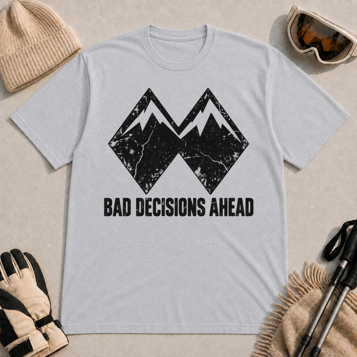 Sport Grey tee featuring a distressed black double-mountain graphic above the phrase “Bad Decisions Ahead.”