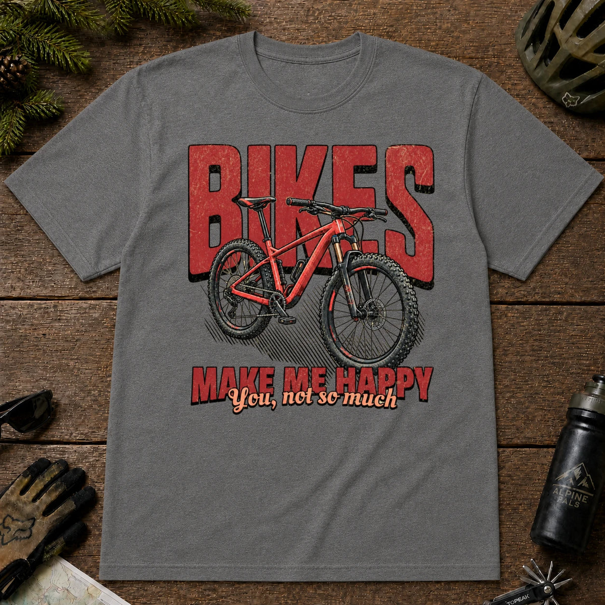 Graphite Heather tee featuring a red mountain bike in front of bold retro “Bikes” lettering with the phrase “Make Me Happy, You Not So Much.”