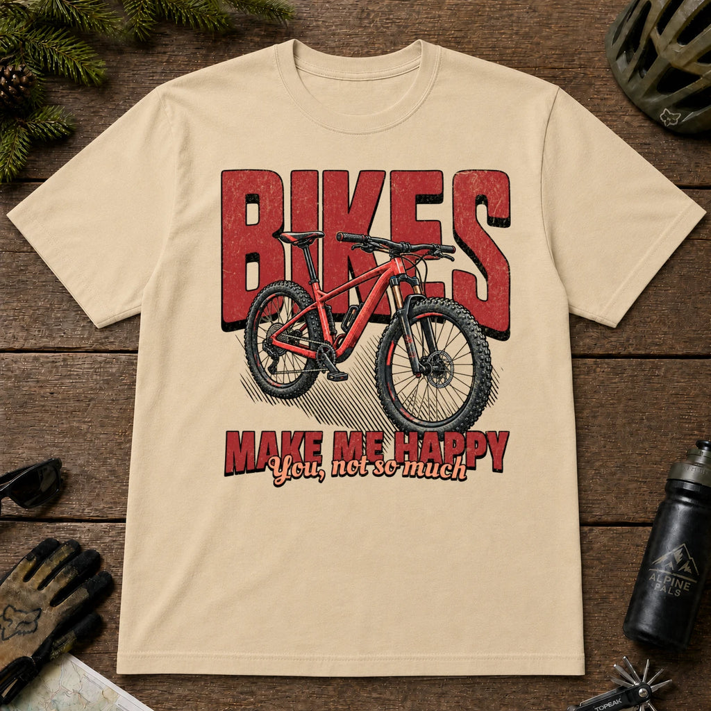 Sand tee featuring a red mountain bike in front of bold retro “Bikes” lettering with the phrase “Make Me Happy, You Not So Much.”