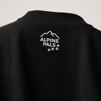 Black shirt with 'Alpine Pals' logo on a light gray background