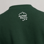 Forest green sweater with 'Alpine Pals' logo on a gray background