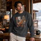 Man wearing a dark heather gray sweatshirt with a graphic design in a cozy indoor setting