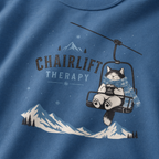Indigo blue t-shirt with a cat on a chairlift graphic and 'Chairlift Therapy' text.