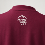 Maroon sweater with 'Alpine Pals' logo on the back against a light gray background