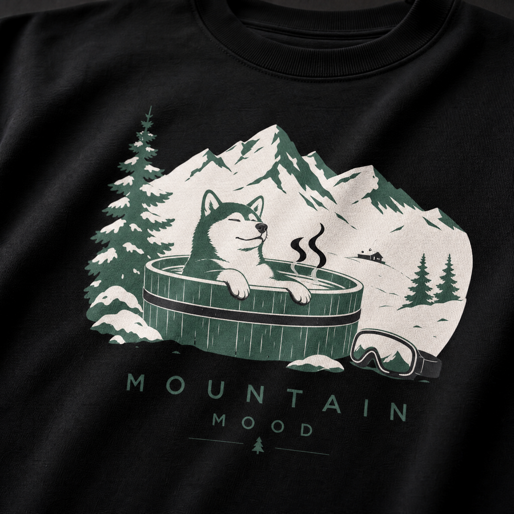 Black t-shirt with a graphic of a dog in a hot tub surrounded by mountains and trees, with 'Mountain Mood' text.