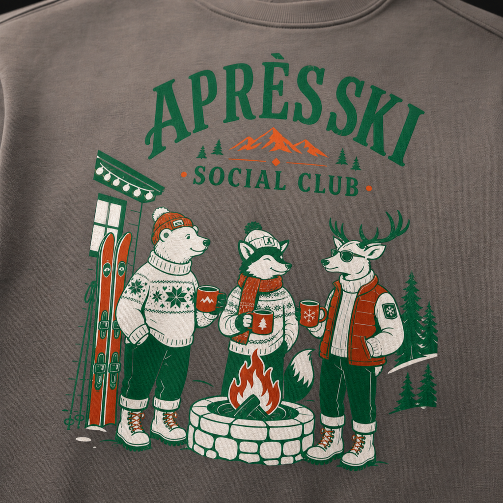 Charcoal gray sweatshirt with 'Apres Ski Social Club' design featuring animals around a fire and skis.