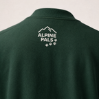 Forest green sweater with 'Alpine Pals' logo on the back