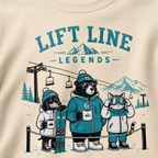 Sweatshirt with cartoon characters at a ski resort and 'Lift Line Legends' text.