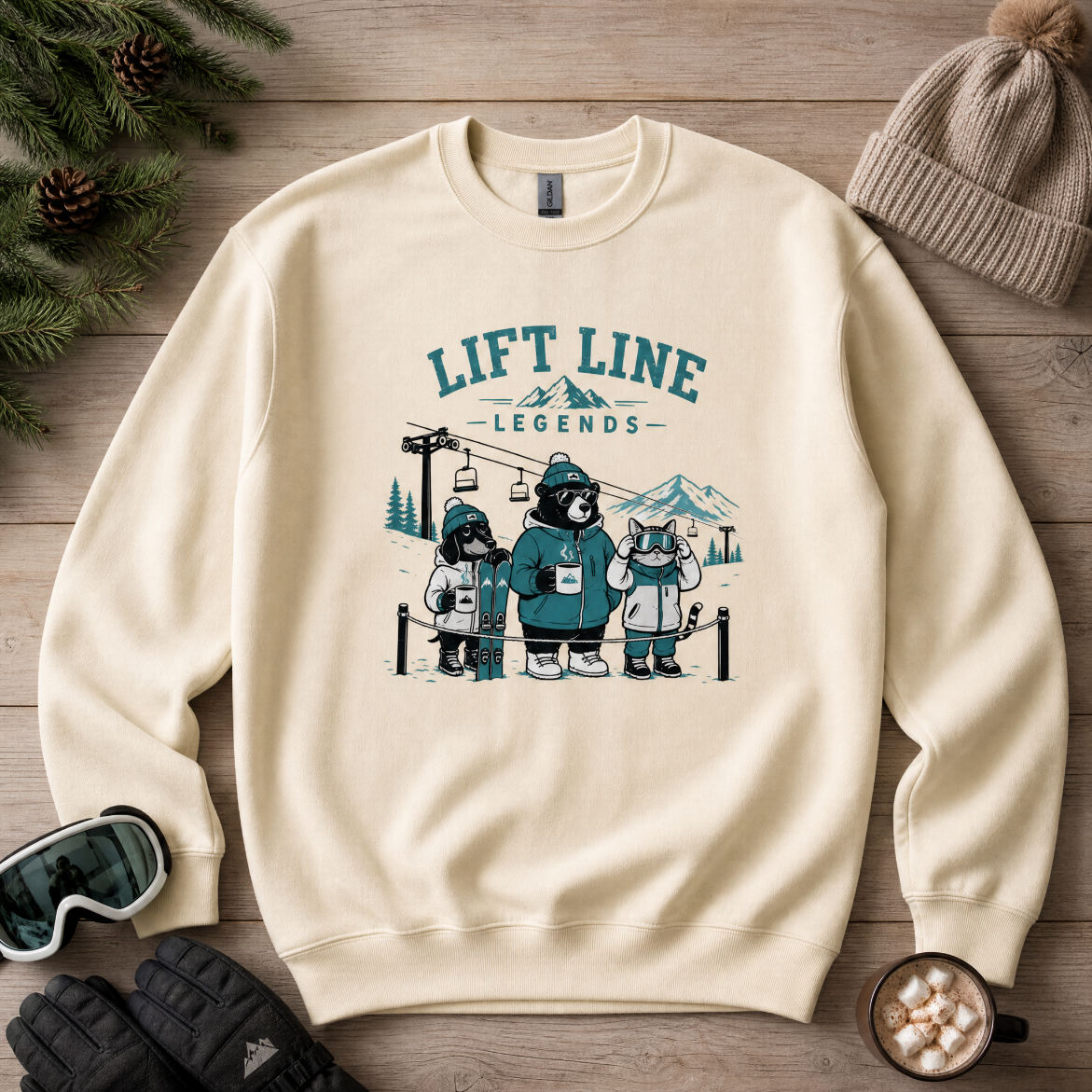 Sand colored crewneck sweater with 'LIFT LINE LEGENDS' text featuring a dog, bear, and cat.