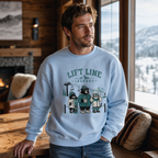 Man wearing a light blue sweatshirt with bear graphics and 'Lift Line Legends' text in a cozy room with a mountain view.
