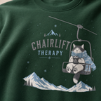 Forest green sweatshirt with a cat on a chairlift graphic and 'Chairlift Therapy' text.