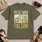 Military Green tee featuring a retro ski and mountain graphic with the phrase “Fresh Snow, Full Send.”