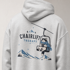 Ash gray hoodie with a cat on a chairlift graphic and 'Chairlift Therapy' text on the back.