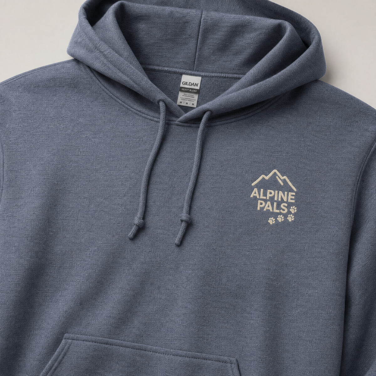 Heather sport dark navy hoodie with 'Alpine Pals' logo on a light gray background