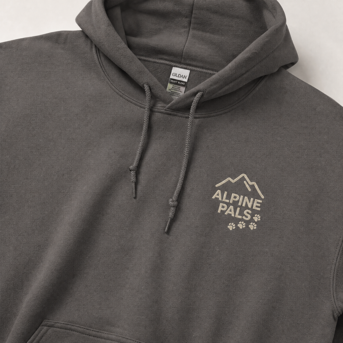 Charcoal gray hoodie with 'Alpine Pals' logo on a white background