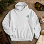 Ash gray hoodie with 'Alpine Pals' logo on a wooden surface with winter accessories.