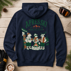 Navy blue hoodie with 'Apres Ski Social Club' design on a wooden surface with winter accessories.