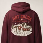 Maroon hoodie with 'Hot Cocoa Patrol' graphic on the back