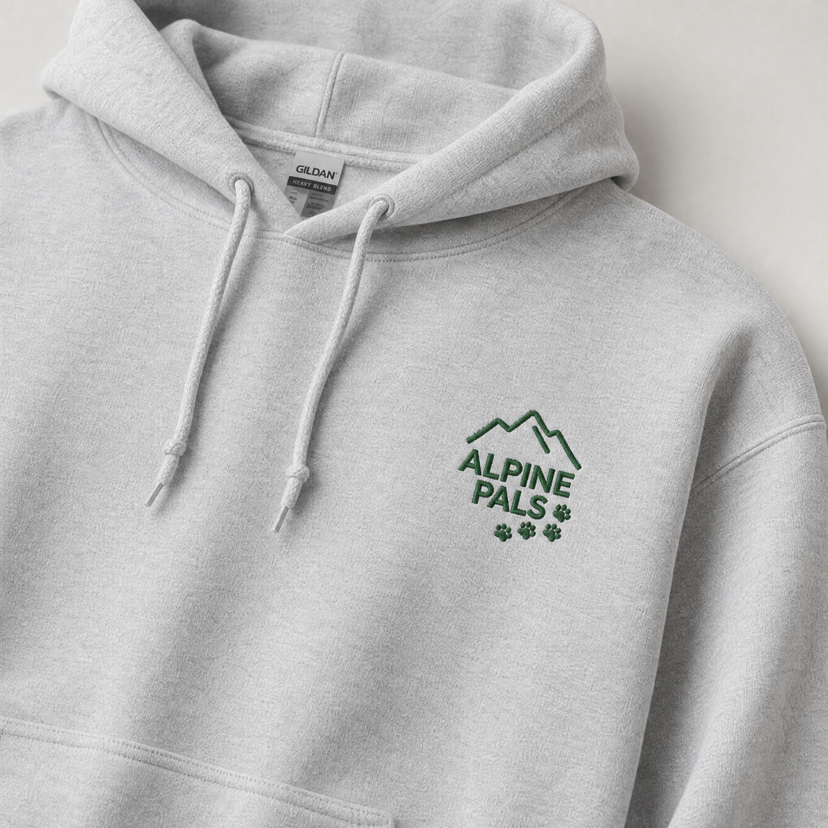 Sport grey hoodie with 'Alpine Pals' logo on a light background