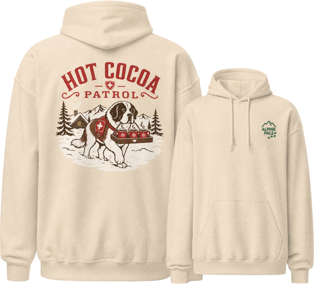 Sand colored hoodie with a graphic of a dog and 'Hot Cocoa Patrol' text on the back, displayed on a white background.