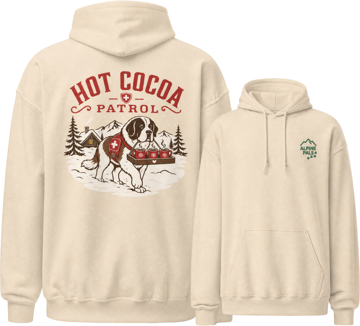 Sand colored hoodie with a graphic of a dog and 'Hot Cocoa Patrol' text on the back, displayed on a white background.