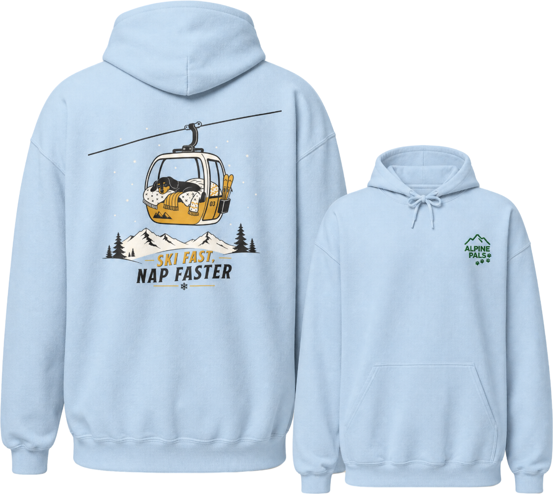 Light blue hoodie with a graphic of a dog in a ski lift and text 'Ski Fast Nap Faster' on the back, with a smaller logo on the chest.