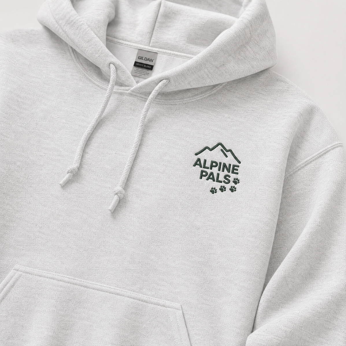 Ash gray  hoodie with 'Alpine Pals' logo on a white background