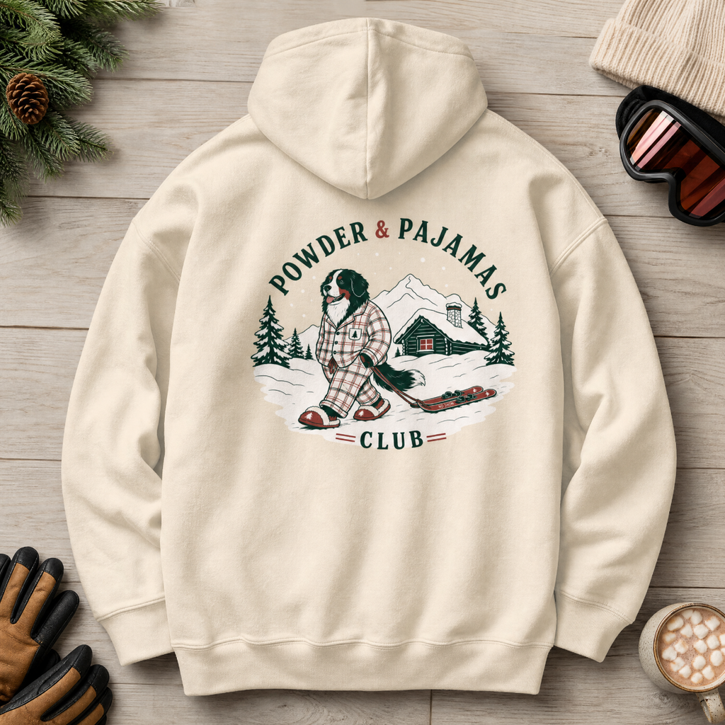 Sand colored hoodie with a dog design and "POWDER & PAJAMAS CLUB" text.