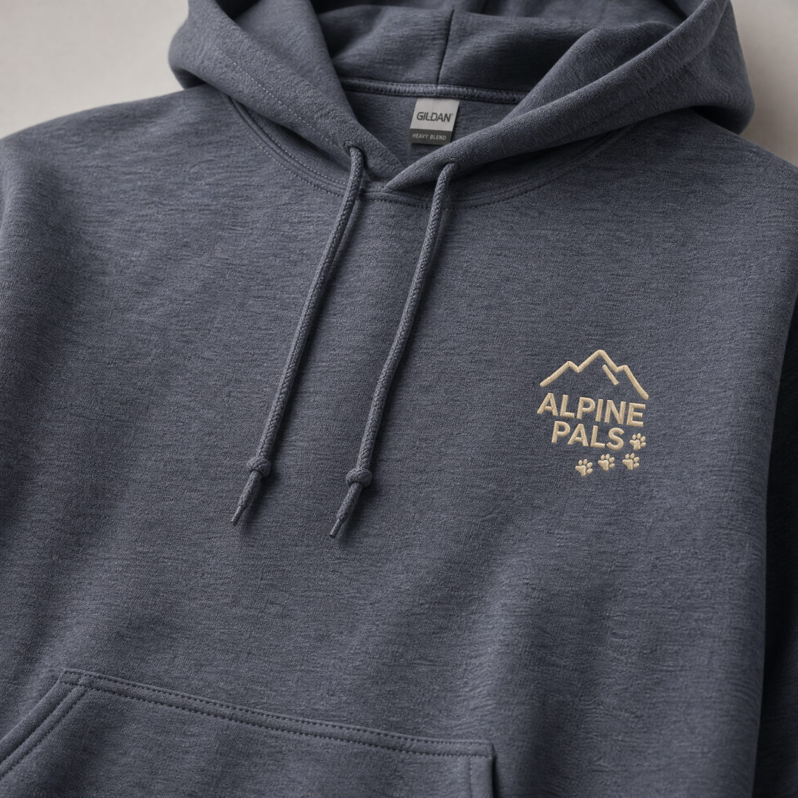 Heather sport dark navy hoodie with 'Alpine Pals' logo on a neutral background