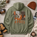Military green hoodie with a cat and skis design on the back, surrounded by winter accessories.