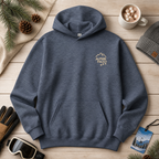 Heather sport dark navy hoodie with 'Alpine Pals' logo on a wooden surface with winter accessories.
