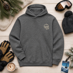 Graphite gray hoodie with 'Alpine Pals' logo on a wooden surface with winter accessories.