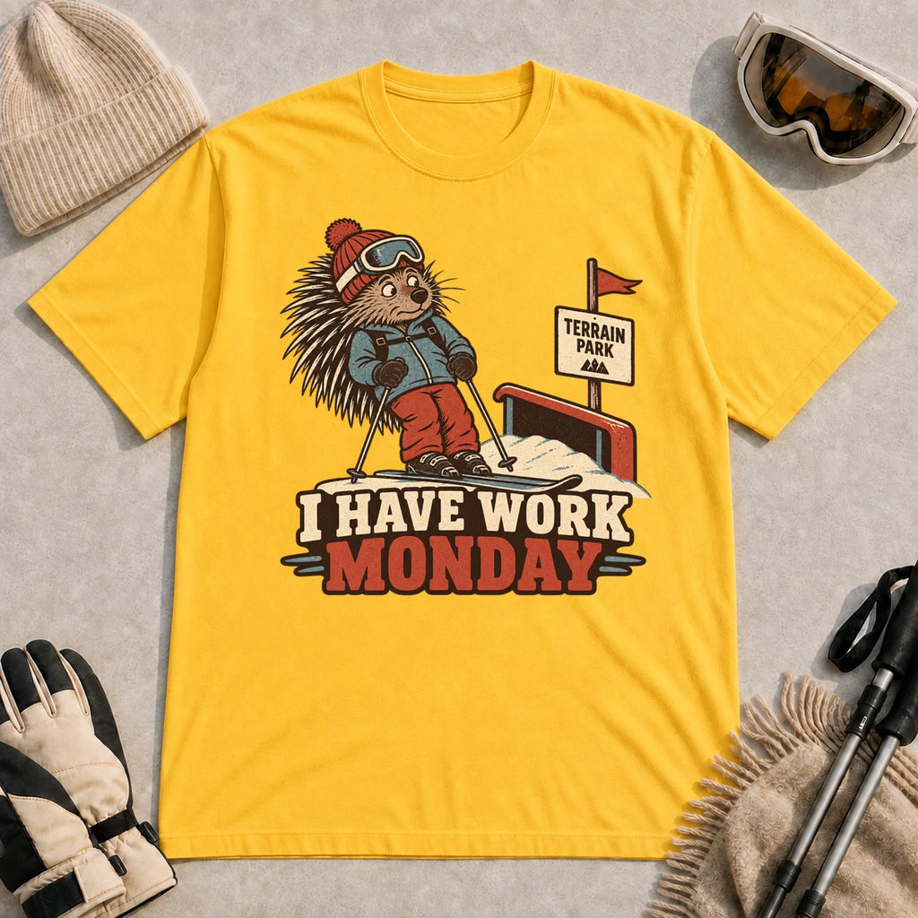 Daisy tee featuring a cautious porcupine skier beside a terrain park rail and sign above the phrase “I Have Work Monday.”