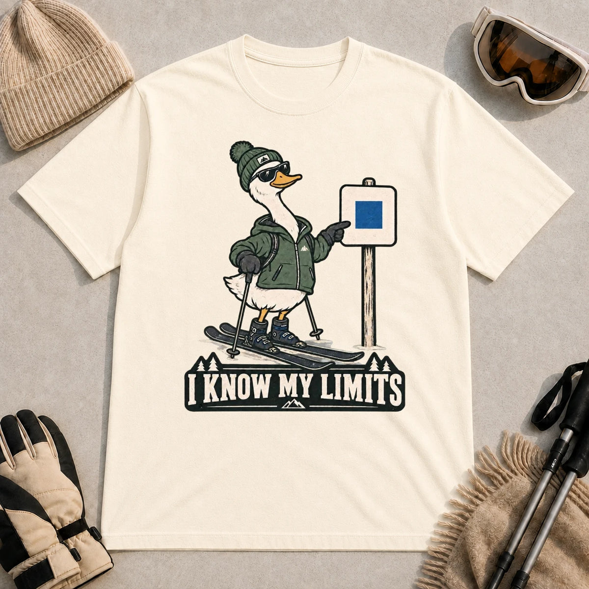Natural tee featuring a cool duck skier pointing to a blue-square trail sign above the phrase “I Know My Limits.”