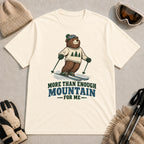 Natural tee featuring a smiling bear skiing in retro mountain gear above the phrase “More Than Enough Mountain for Me.”