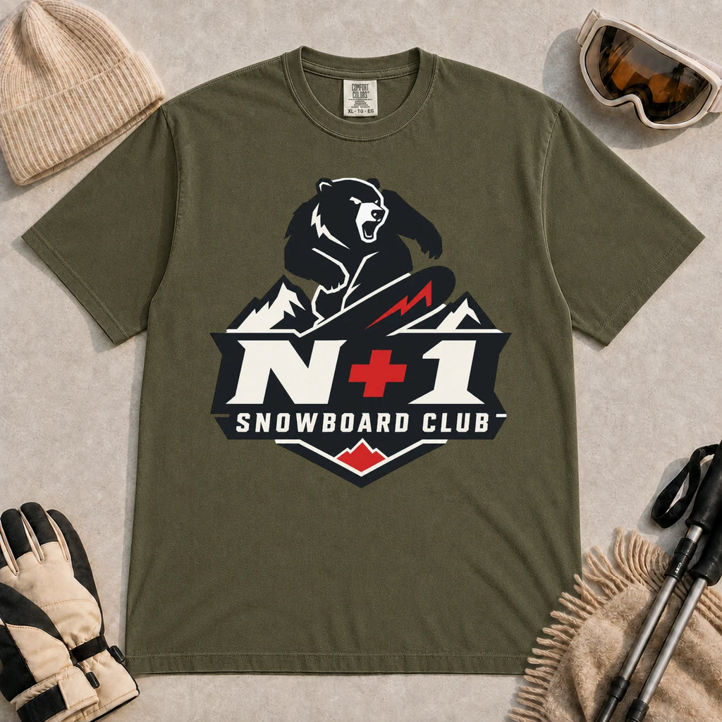 Hemp tee featuring a bear snowboarding above a bold mountain badge with the phrase “N+1 Snowboard Club.”