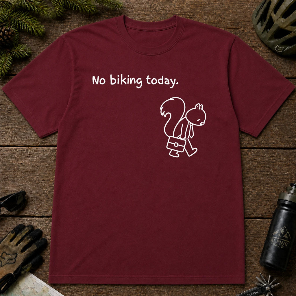 Maroon tee featuring a sad squirrel dressed for work and carrying a briefcase beneath the phrase “No biking today.”
