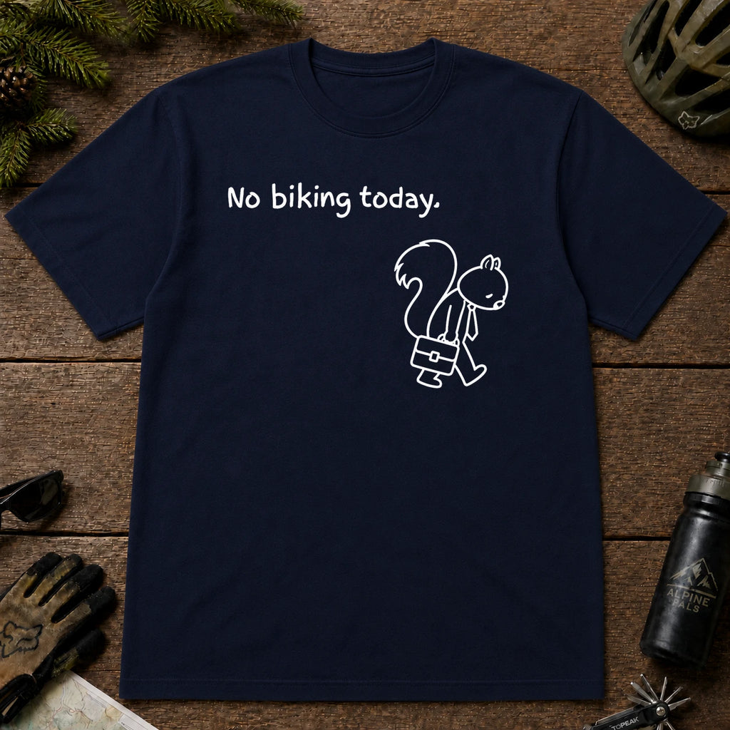 Navy tee featuring a sad squirrel dressed for work and carrying a briefcase beneath the phrase “No biking today.”