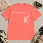 Coral Silk tee featuring a sad bear dressed for work and carrying a briefcase beneath the phrase “No skiing today.”