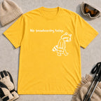 Daisy tee featuring a sad raccoon dressed for work and carrying a briefcase beneath the phrase “No snowboarding today.”