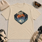 Sand tee featuring a vintage fox snowboarding over snowy mountains at night with the phrases “Powder Thief” and “Night Shift Snowboard Crew.”