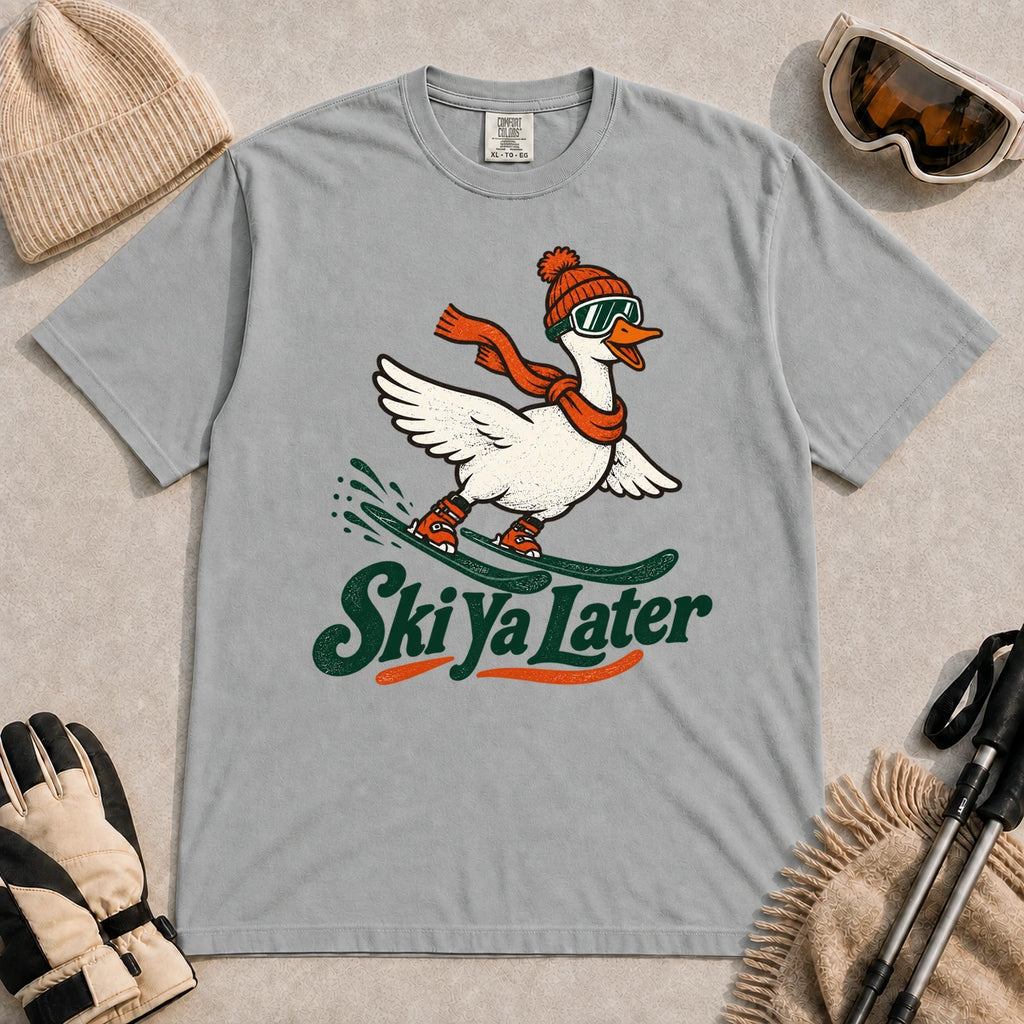 Granite tee featuring a playful goose skiing in goggles and a beanie above the phrase “On Your Left, Losers.”