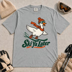 Granite tee featuring a playful goose skiing in goggles and a beanie above the phrase “On Your Left, Losers.”