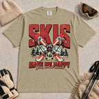 Khaki tee featuring crossed skis and poles in front of bold retro “Skis” lettering with the phrase “Make Me Happy, You Not So Much.”