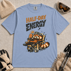 Washed denim tee featuring a relaxed red panda lounging in a chair with snowboard gear and the phrase “Half-Day Energy.”
