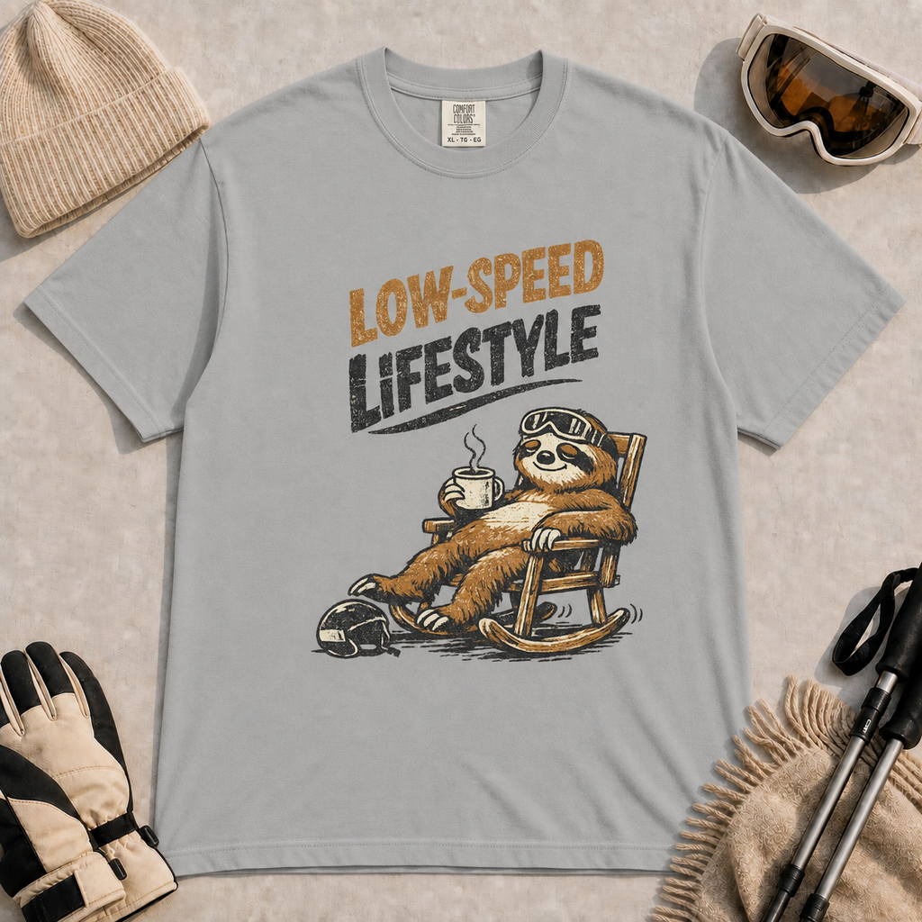 Granite t-shirt featuring a vintage sloth wearing ski goggles and relaxing in a rocking chair with a hot drink, with the phrase “Low-Speed Lifestyle.”