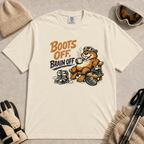 Ivory t-shirt featuring a laid-back beaver  enjoying a hot drink beside ski boots, a helmet and snowboard with the phrase “Boots Off, Brain Off.”